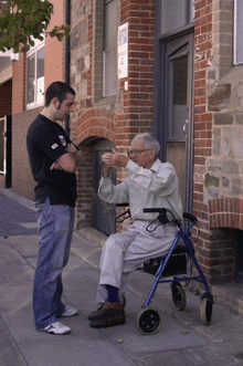 Jim Gunn with grandson Ben in Divett Street, Port Adelaide